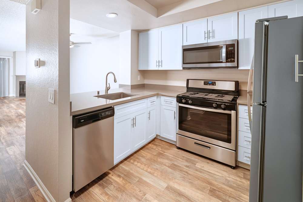 A Luxury apartment kitchen at Sonora at Alta Loma in Alta Loma, California