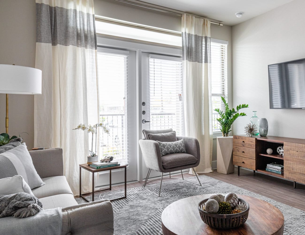 Open-concept floor plan and spacious living room at Opal at Barker Cypress in Houston, Texas