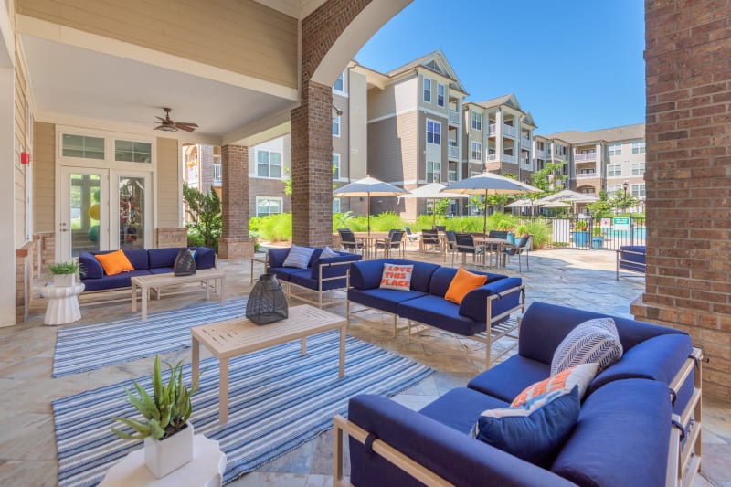 Cozy lounge chairs near clubhouse in Raleigh, North Carolina