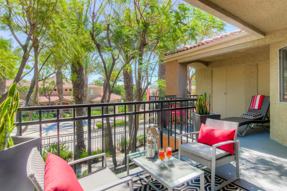 Refreshing outdoor patio space at Tuscany Village Apartments in Ontario, California