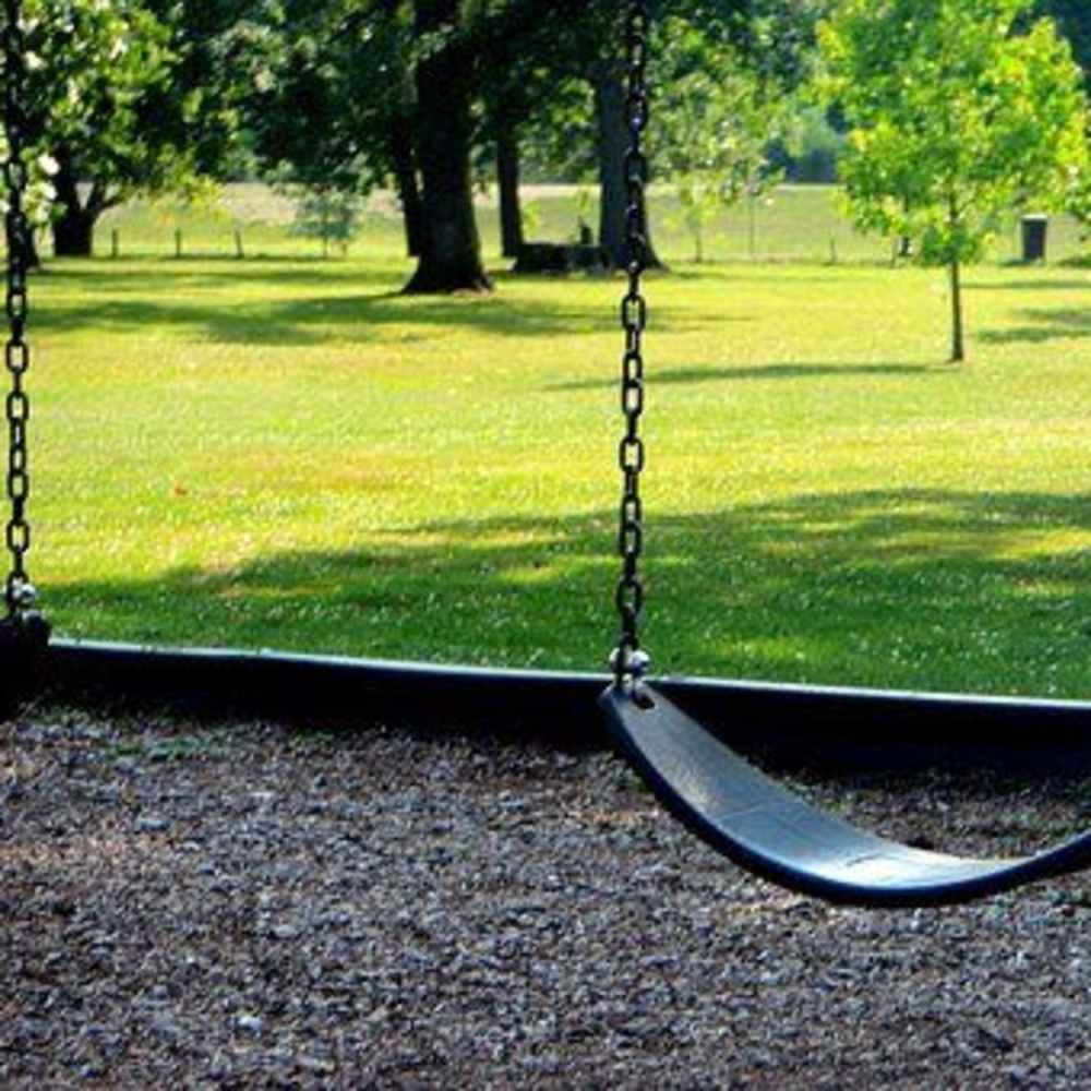 Playground with swings at Lankershim Arms in North Hollywood, California, 