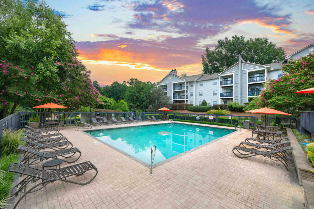Pool area with lounge seating at The Ellery of Cary in Cary, North Carolina