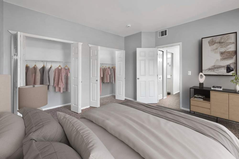 Bedroom and closets at Westridge Apartments in Aurora, Colorado