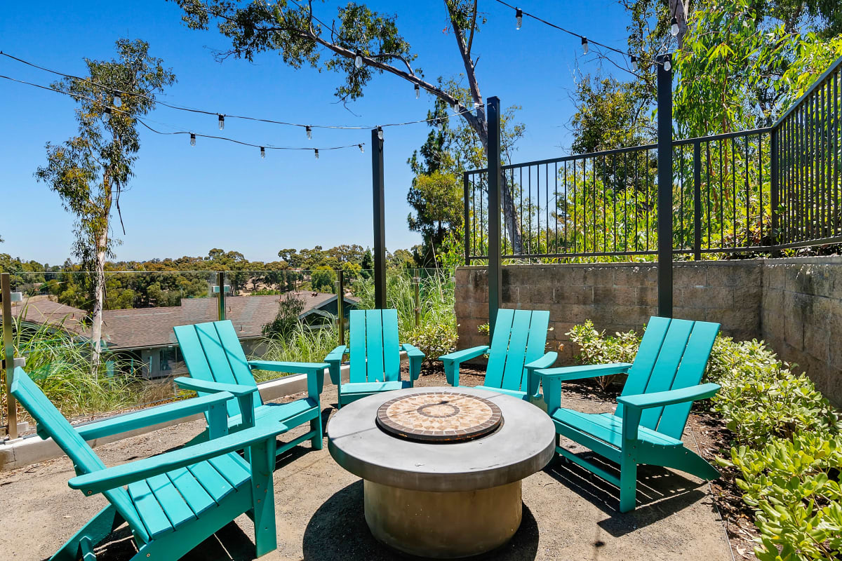 Firepit with blue chars at The Avenue at Carlsbad in Carlsbad, California