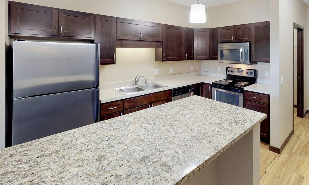 Fully equipped kitchen at Oaks Station Place in Minneapolis, Minnesota