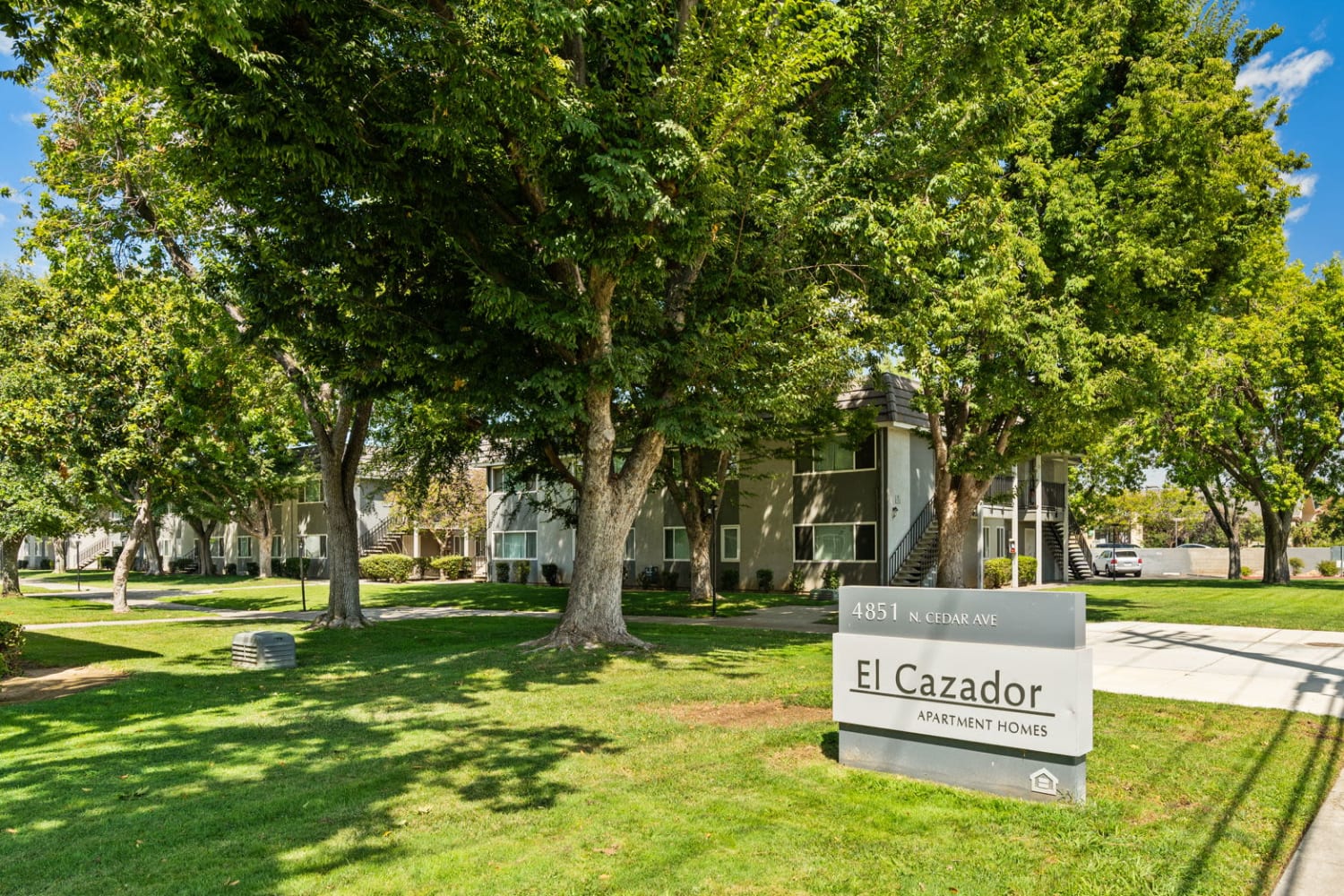 Monument sign at El Cazador in Fresno, California