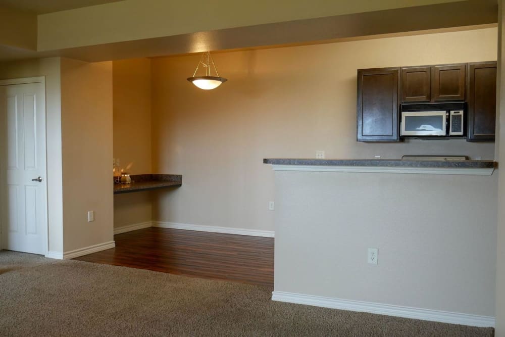 Fully equipped kitchen overlooking the living room area at Anatole on MacArthur in Oklahoma City, Oklahoma