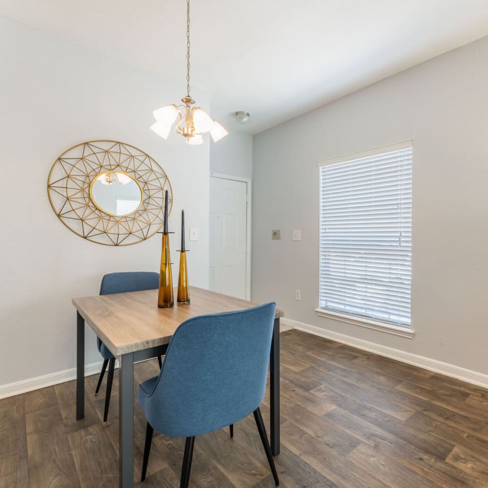 Resident living space with table and chairs at The Gentry in Houston, Texas