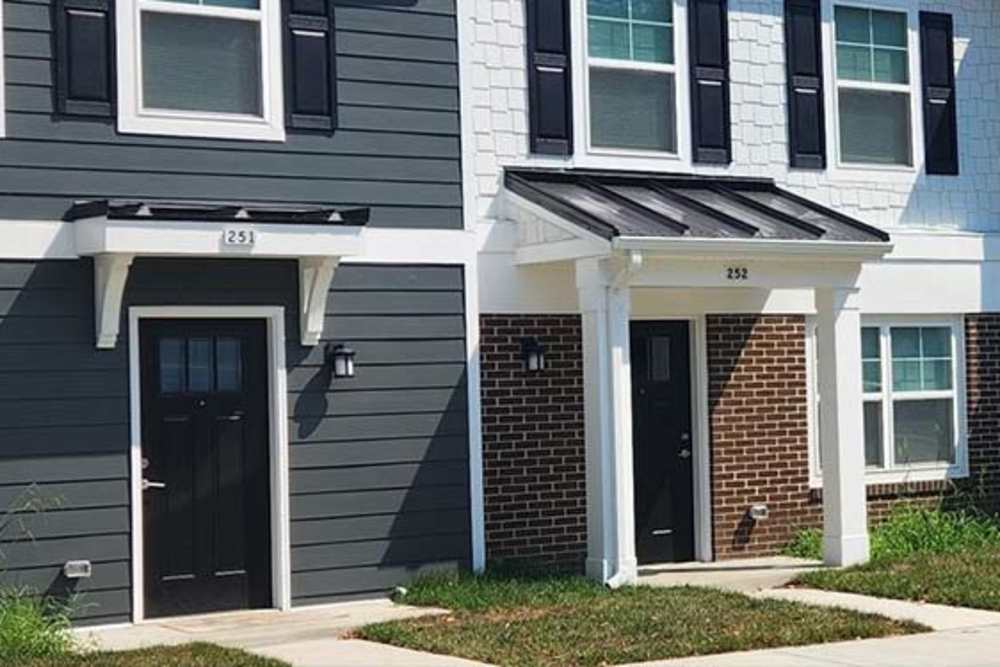 Modern apartment entrances at The Towns at Patuxent Overlook in Lexington Park, Maryland