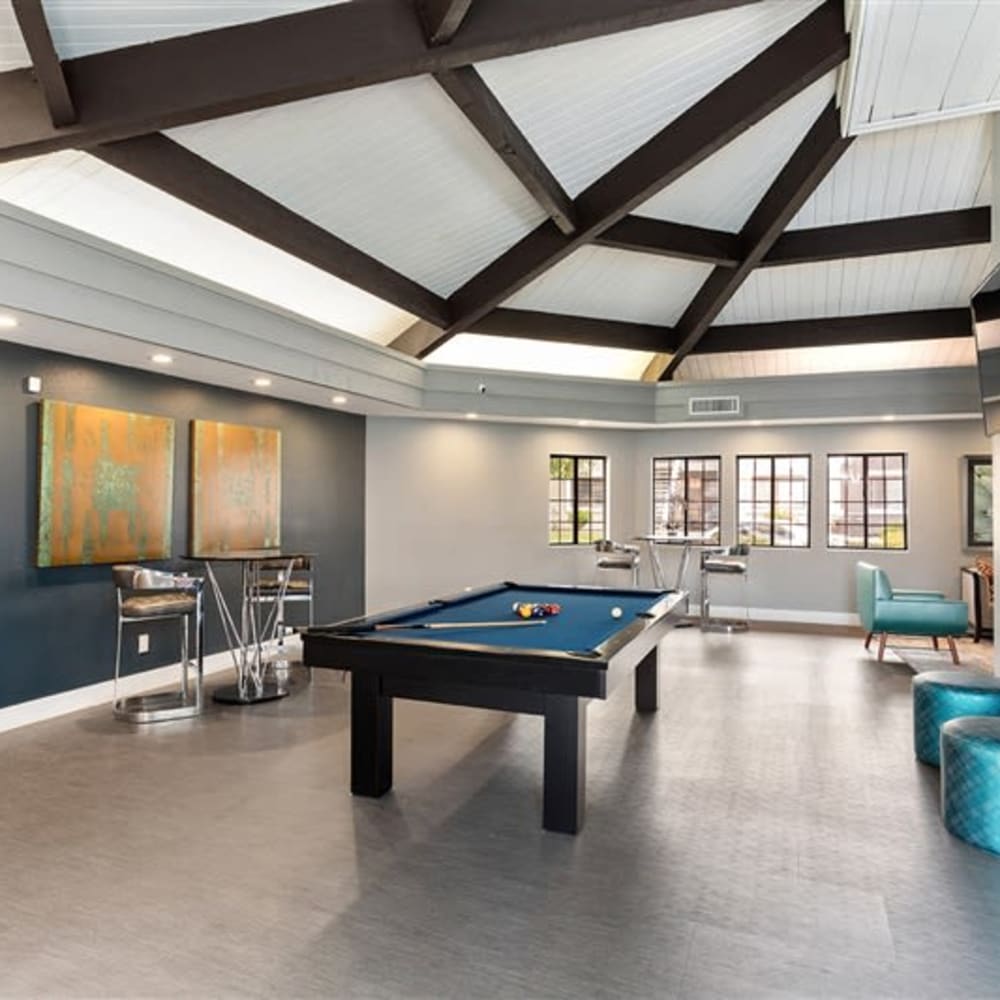 A game room with a pool table at Argenta Apartments in Mesa, Arizona