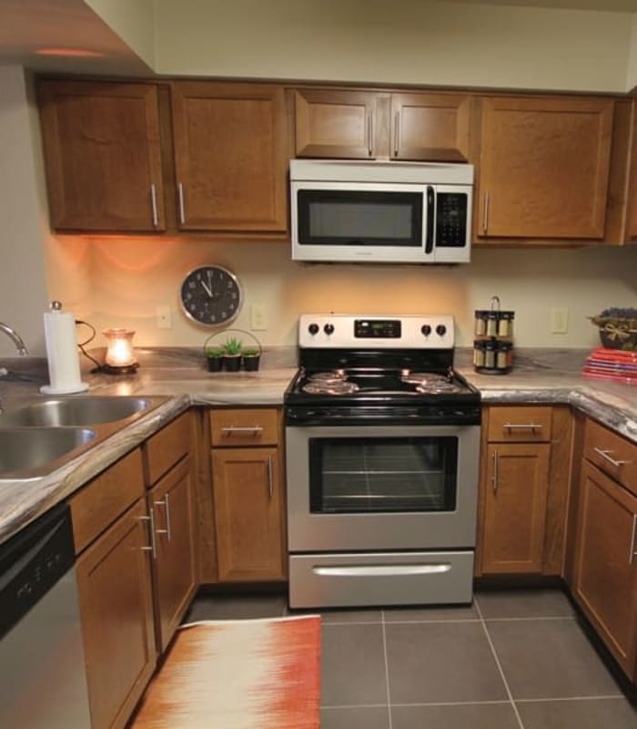 Kitchen with granite countertops at The Icon at Lubbock in Lubbock, Texas