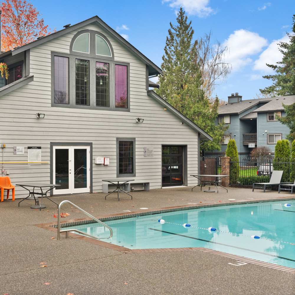 Charming community with swimming pool at Lodge at Madrona Ridge in Tacoma, Washington