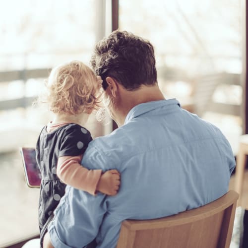 Resident with his daughter at Solaire 8250 Georgia in Silver Spring, Maryland