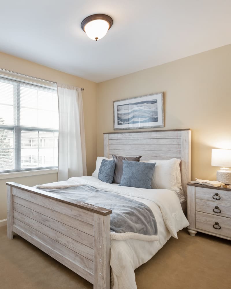 Bed in a 1 bedroom senior apartment at The Hearth at Hendersonville in Hendersonville, Tennessee