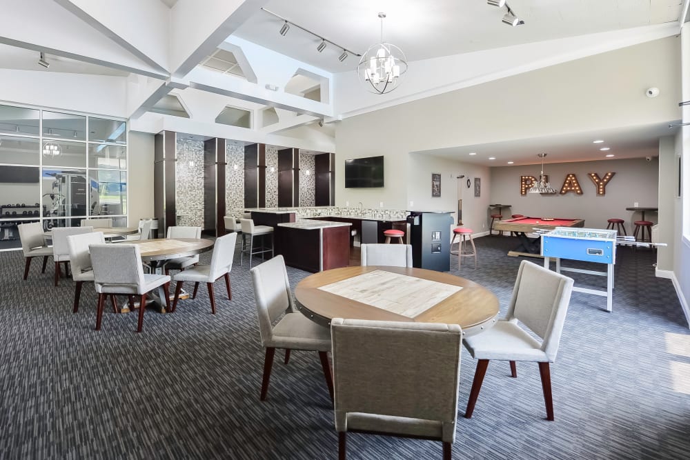 Resident clubhouse with a kitchen and billiards at Timberlake Apartment Homes in East Norriton, Pennsylvania