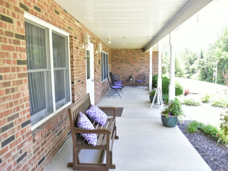 Covered porch at Reflections at Garden Place in Columbia, Illinois. 