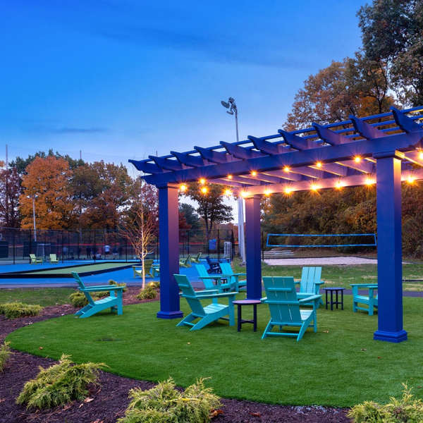 Rendering of tennis court and seating area at The Green at 9&90 in Framingham, Massachusetts