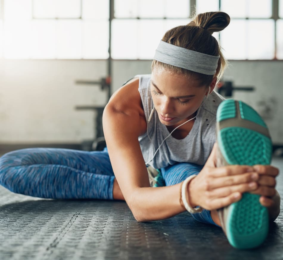 Resident staying in shape in the fitness center at Sofi Union City in Union City, California