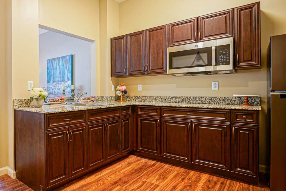 Modern kitchens in apartments at Harmony at Harts Run in Glenshaw, Pennsylvania