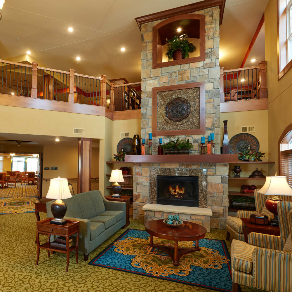 Lobby with a fireplace at Applewood Pointe of Bloomington at Valley West in Bloomington, Minnesota.