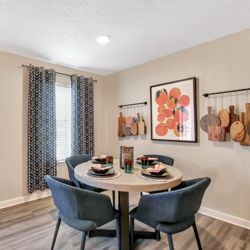 Round dining table in the open space kitchen at Lockhart Apartment Homes in Mesquite, Texas