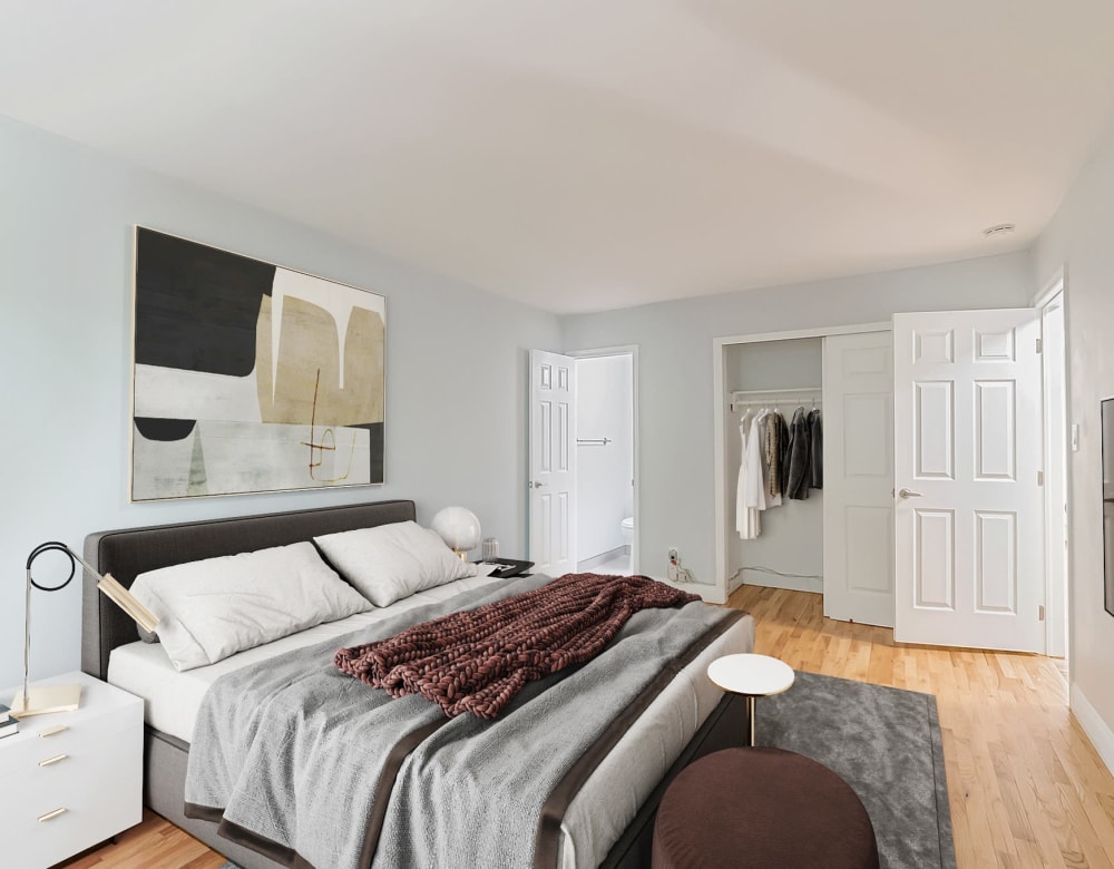 Bedroom with hardwood floor at Eagle Rock Apartments at Nesconset in Nesconset, New York