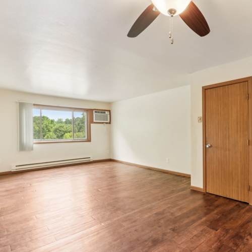 Apartment living area at Woodfield Heights Apartments in Waukesha, Wisconsin