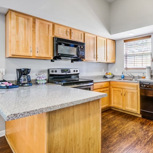 Kitchen with appliance at Regency & Victor Villas Apartments in Victor, New York