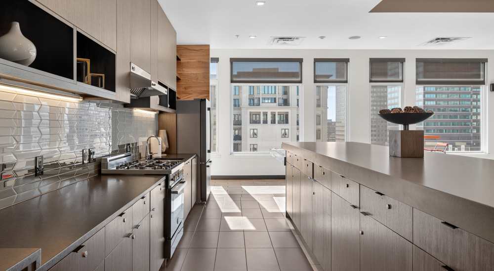 Clubhouse with seating area and a TV at SOVA on Grant in Denver, Colorado