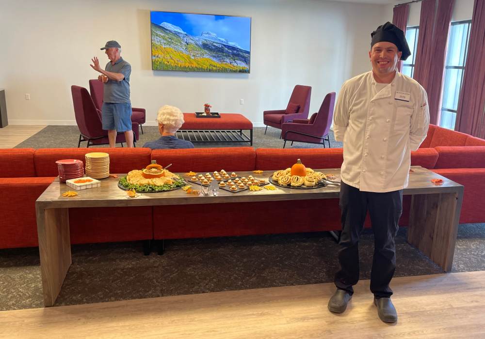 Chef standing next to a buffet at Mission Ridge in Springfield, Missouri