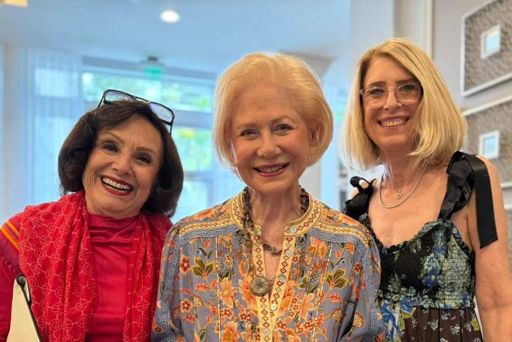 Residents posing for a picture at The Barclay at ParkSquare in Aventura, Florida