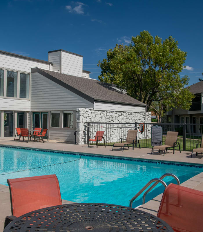 Sparkling pool and sundeck outside of Aspen Park Apartments in Wichita, Kansas
