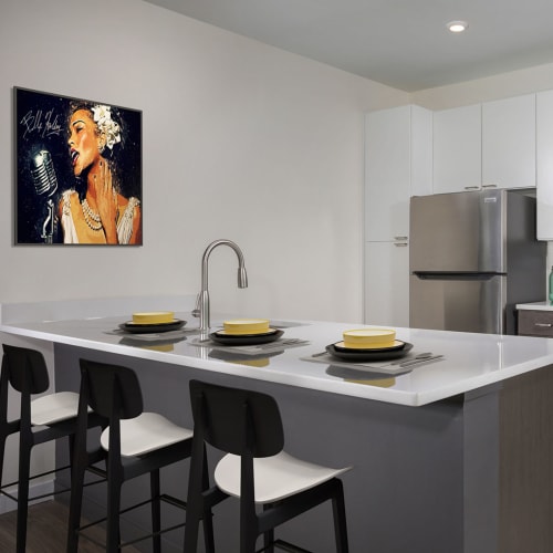 Model kitchen with countertop dinner settings at The Ella Scott's Addition in Richmond, Virginia