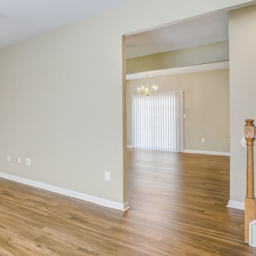 A living space with wood floors at Midway Manor in Virginia Beach, Virginia