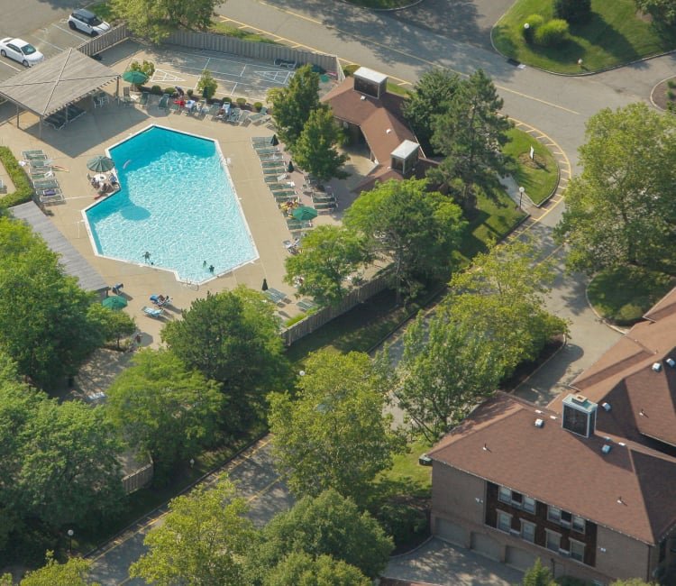 Aerial view of gorgeous swimming pool and units at Everly Roseland in Roseland, New Jersey