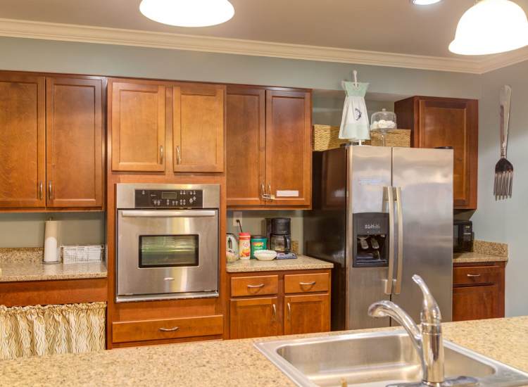 Kitchen and island with stylish laminate countertops at Barstow Village in Hanover, Massachusetts