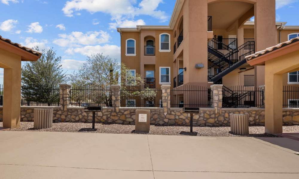 Picnic area with BBQ grill at Las Torres Apartments in El Paso, Texas