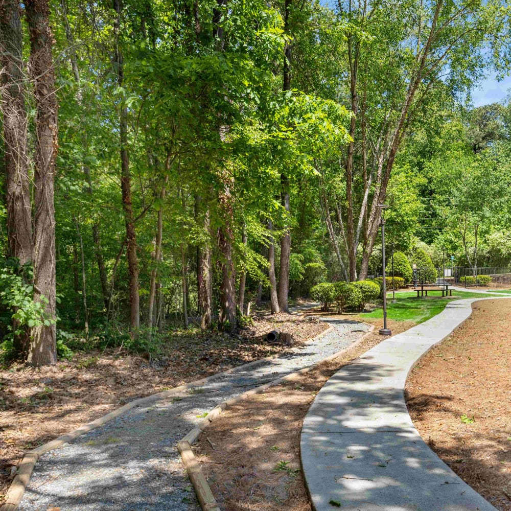 Walking path through the wooded grounds at Hawthorne Gates in Atlanta, Georgia