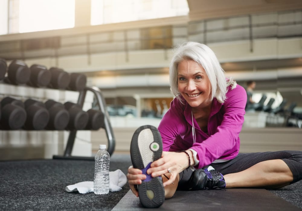 Resident stretching at gym nearby Decatur Victoria Estates in Berlin, Maryland