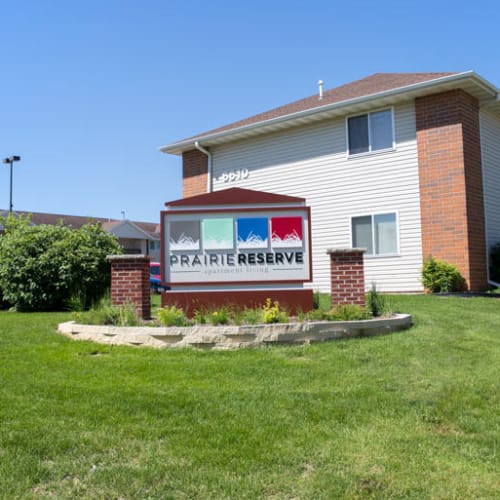 Community signage outside of an apartment building at Prairie Reserve in Cedar Rapids, Iowa