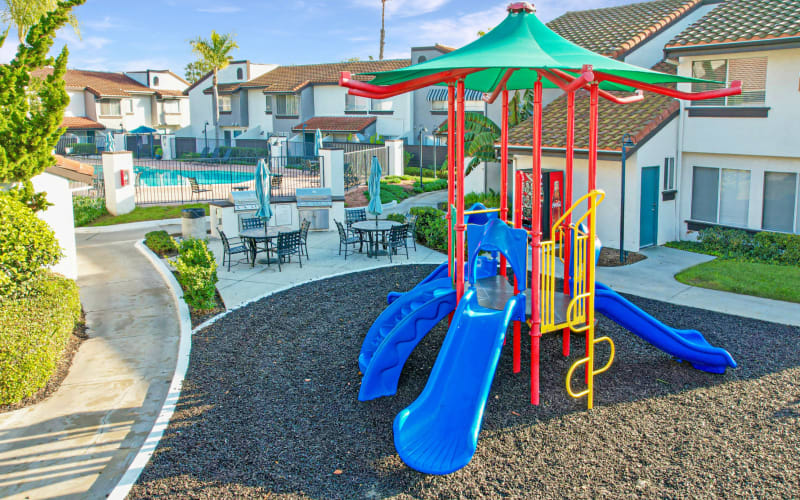 A playground next to the pool at Portofino Townhomes in Wilmington, California