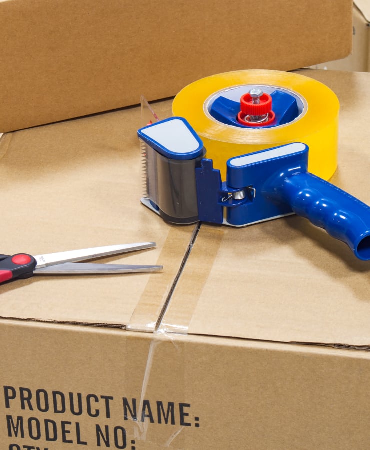 Packing tape and scissor help get belongings ready to store at Security Storage in Sparks, Nevada