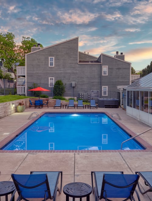 Pool view at sunset at Bluesky Landing Apartments in Lakewood
