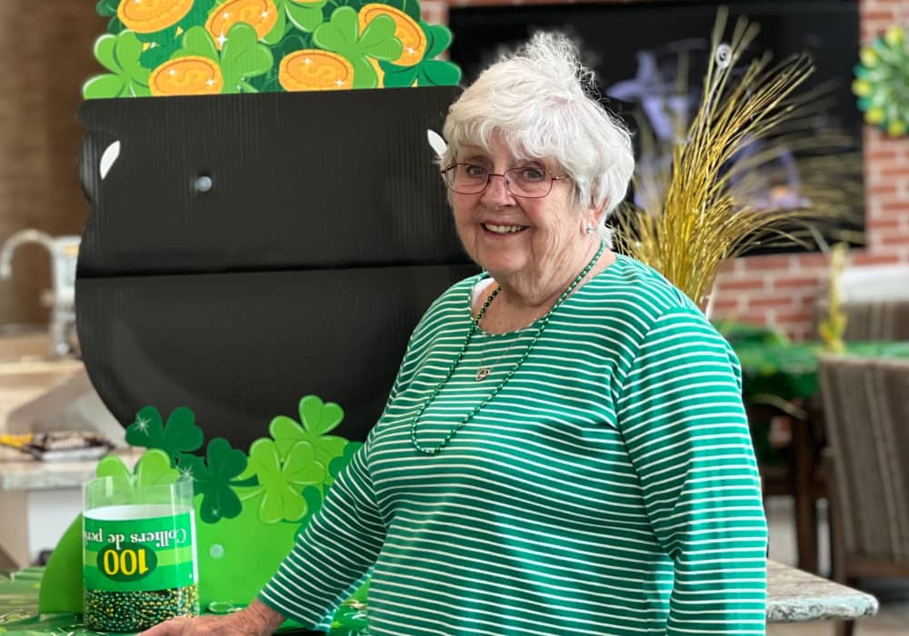 Resident celebrating St. Patrick's Day at Merrill Gardens at Columbia in Columbia, South Carolina