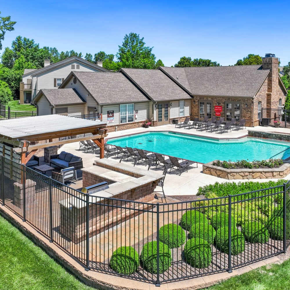 Exterior apartment view with pool area at Prairie Point Luxury Apartments in O'Fallon. MO