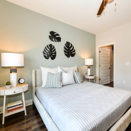 Bedroom with vaulted ceilings and a ceiling fan at Somerset in McDonough, Georgia