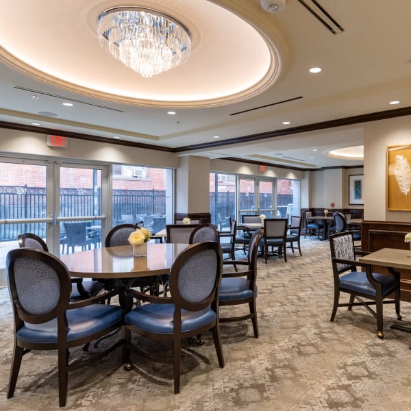 Large dining room at Hollywood Hills Senior Living in Los Angeles, California.