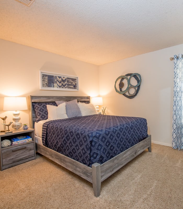 Chic bedroom at Sunchase Apartments in Tulsa, Oklahoma