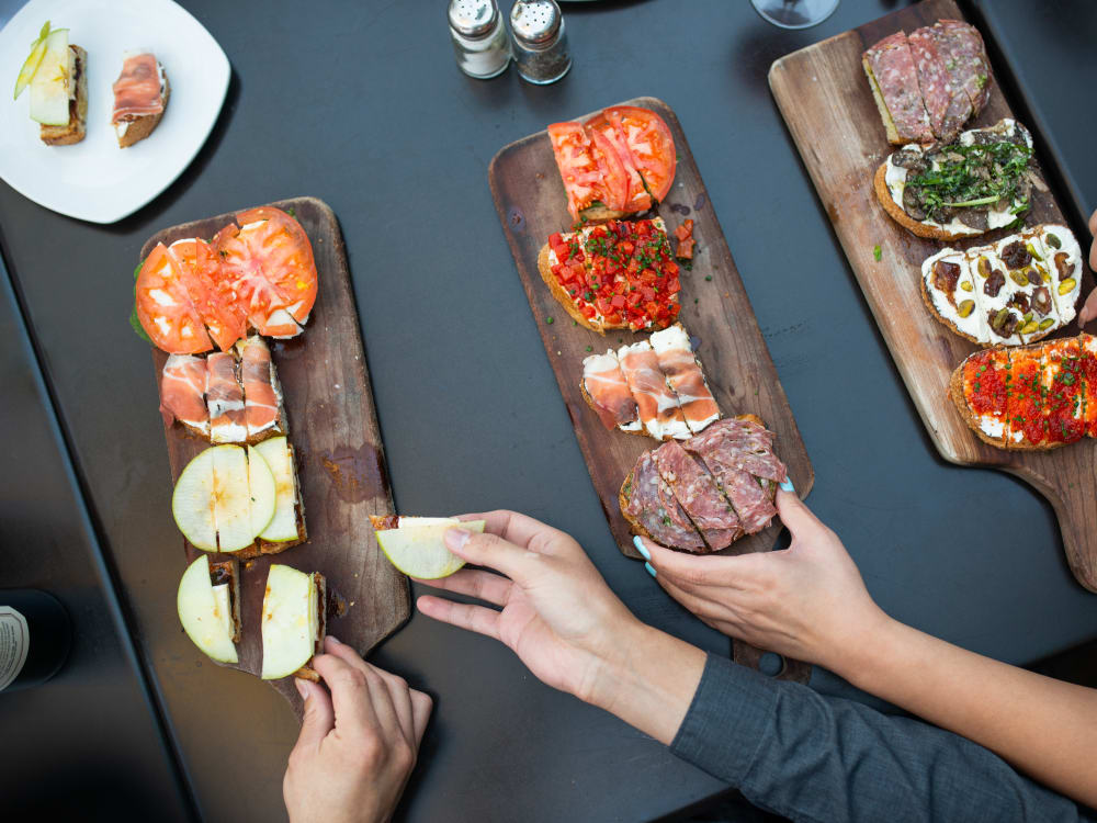 Residents enjoying appetizers at a local restaurant near San Sonoma in Tempe, Arizona