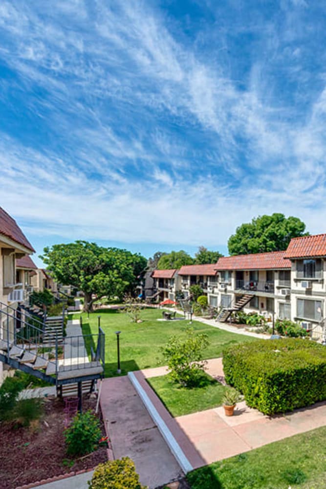 Exterior views with blue sky at Valley Pride Village in Sylmar, California